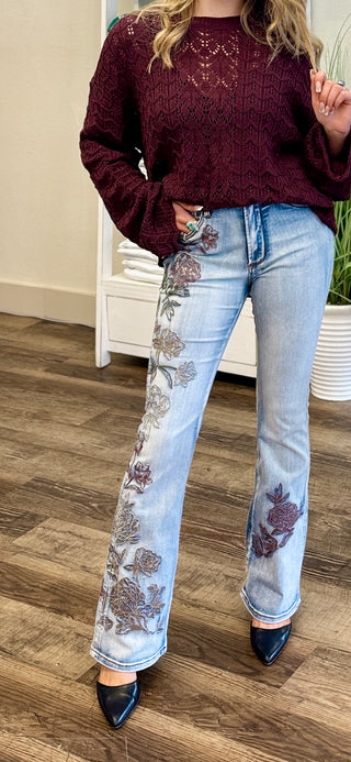 Untamed Rose Bootcut Jeans with floral embroidery and washed denim